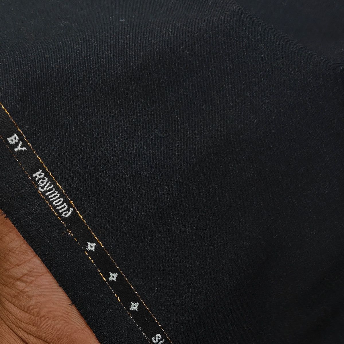 Raymond Exotic Premium Super 130s Count 70% wool Plain Suiting Fabric Colour Blackish Grey