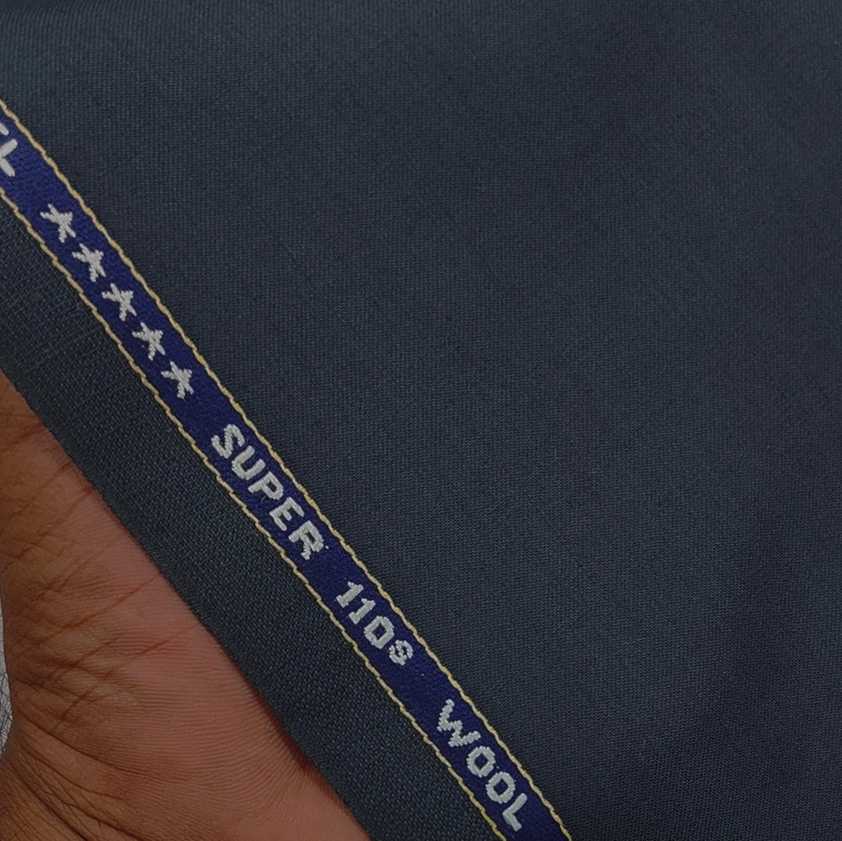 Raymond Exotic Premium Super 110s Count 60% wool Plain Suiting Fabric Colour Greyish Blue